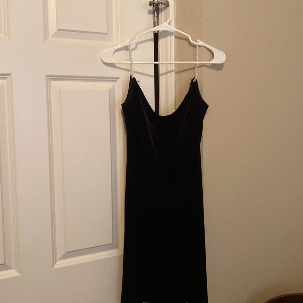 Black velvet dress with pearl straps. Fits size small-medium